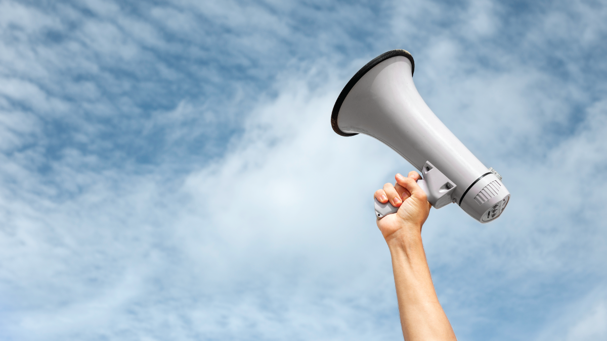 hand holding megaphone