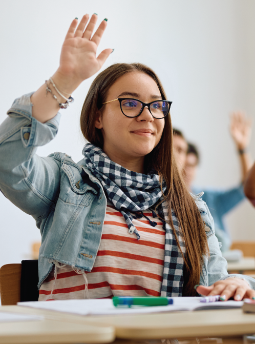 female high school student raising hand