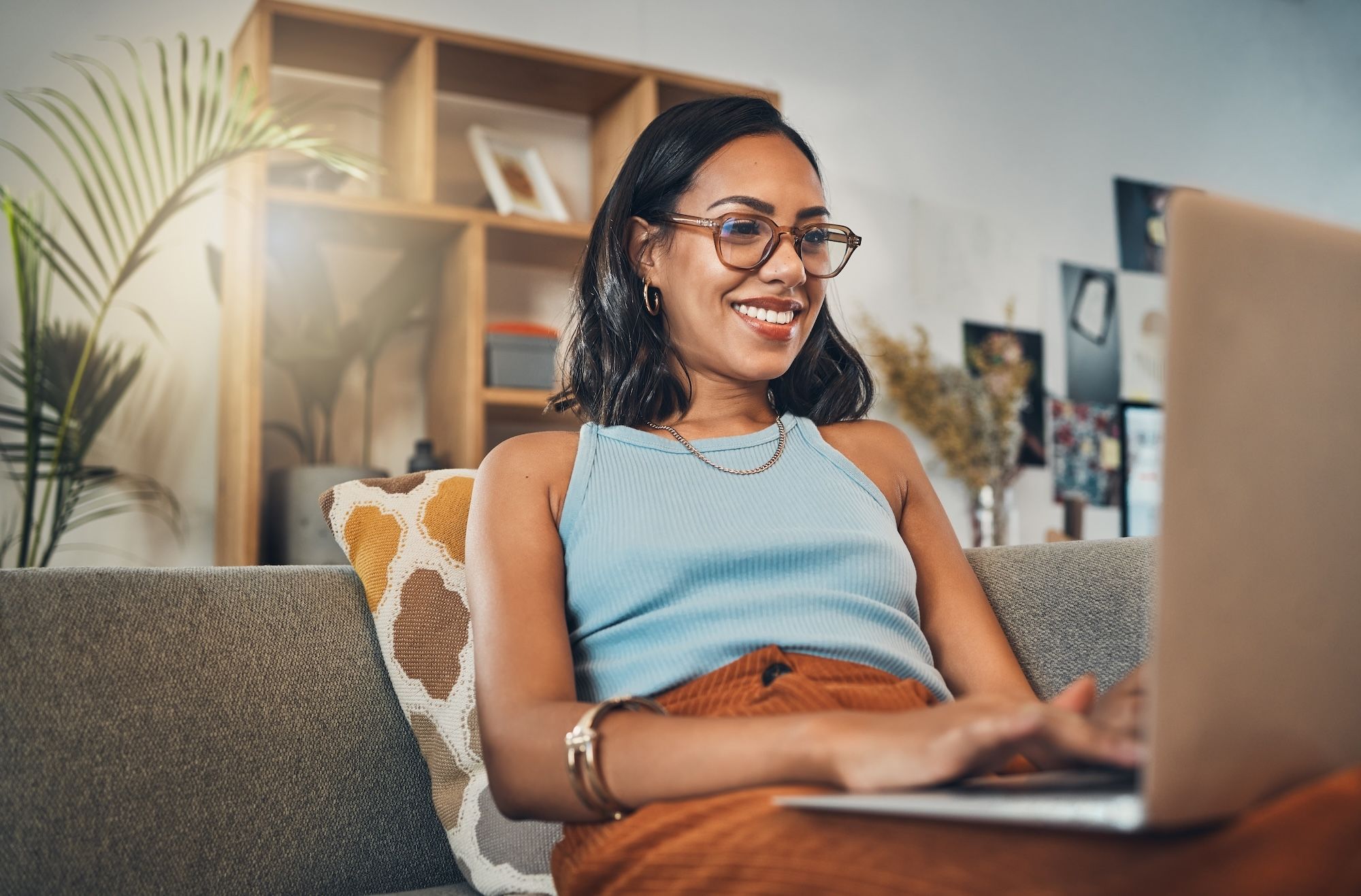 Young woman and working from home with a smile.