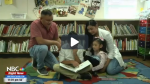 Latino family in school library